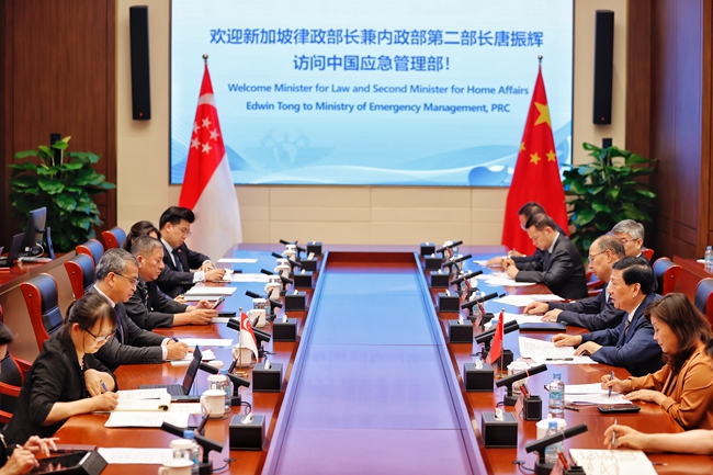 王祥喜會見新加坡律政部長兼內(nèi)政部第二部長唐振輝